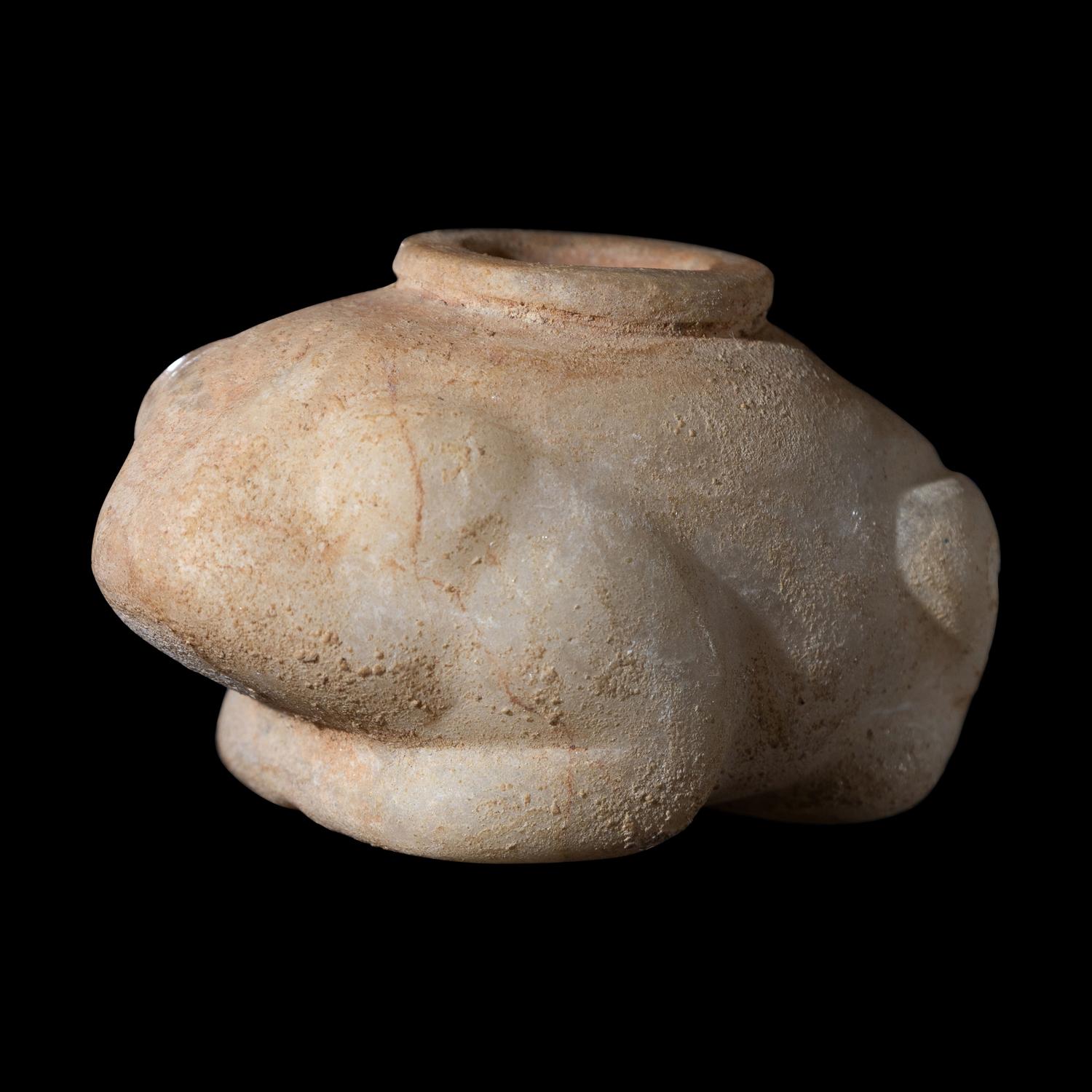 An Egyptian Calcite Frog Vessel