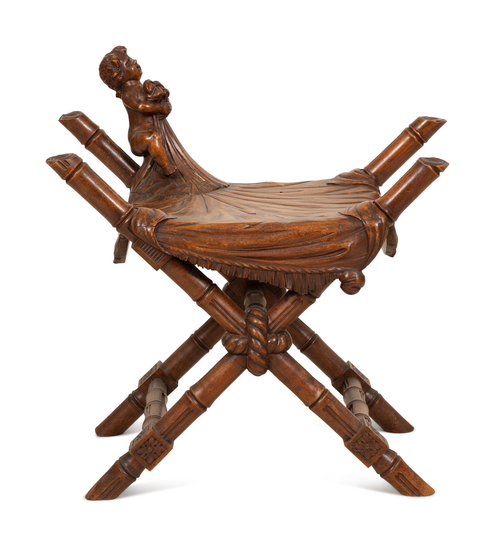 A Continental Carved Walnut X-form Stool