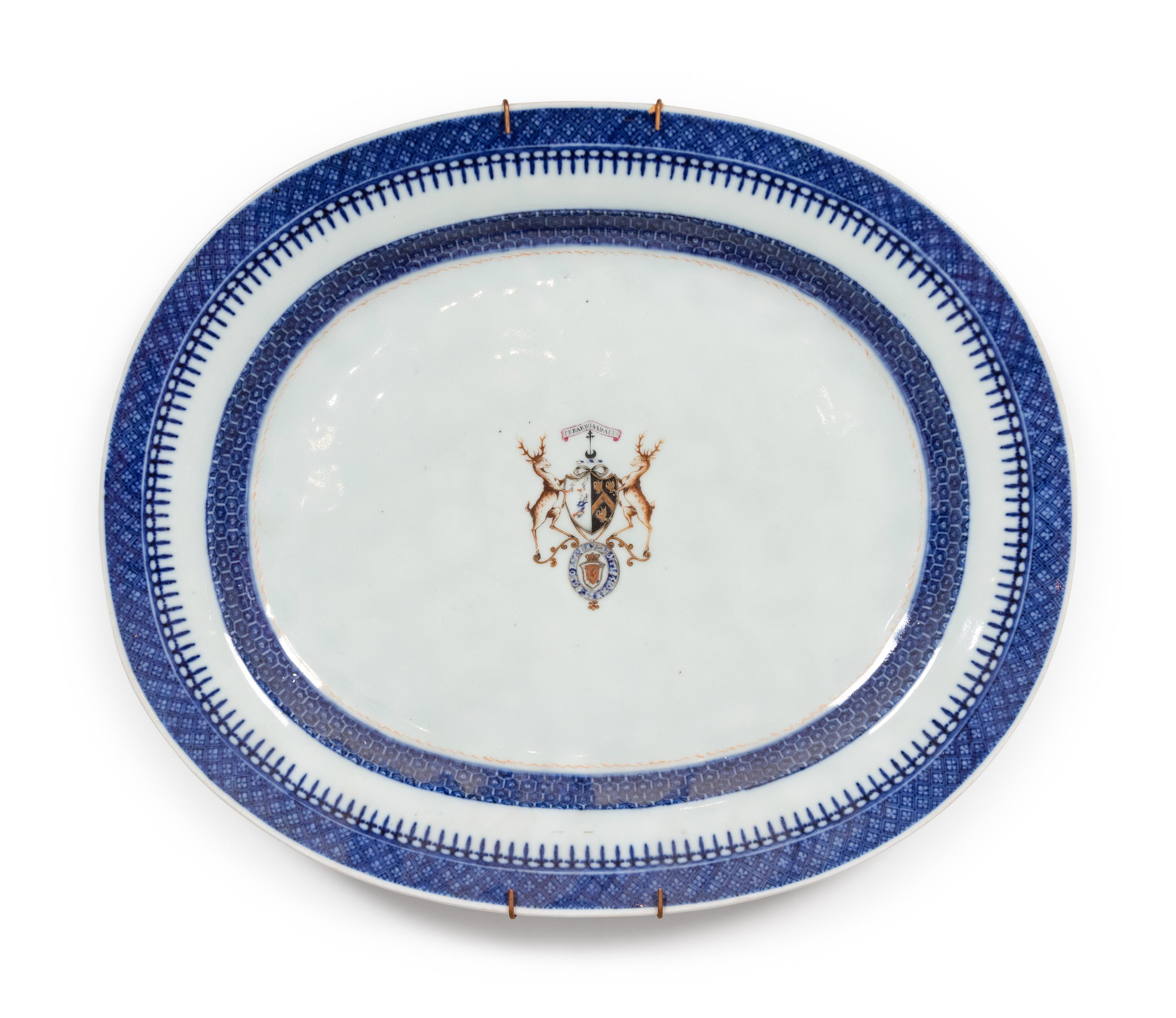 Seven Chinese Export Armorial Porcelain Plates