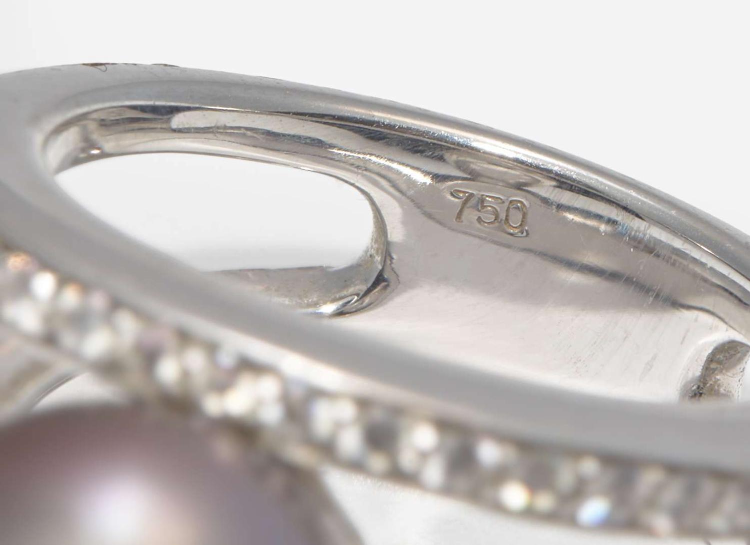 An 18K White Gold, Diamond, and Pearl Bracelet and Ring