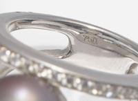 An 18K White Gold, Diamond, and Pearl Bracelet and Ring