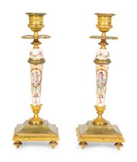 A Pair of French Gilt Bronze and Painted Porcelain Candlesticks
