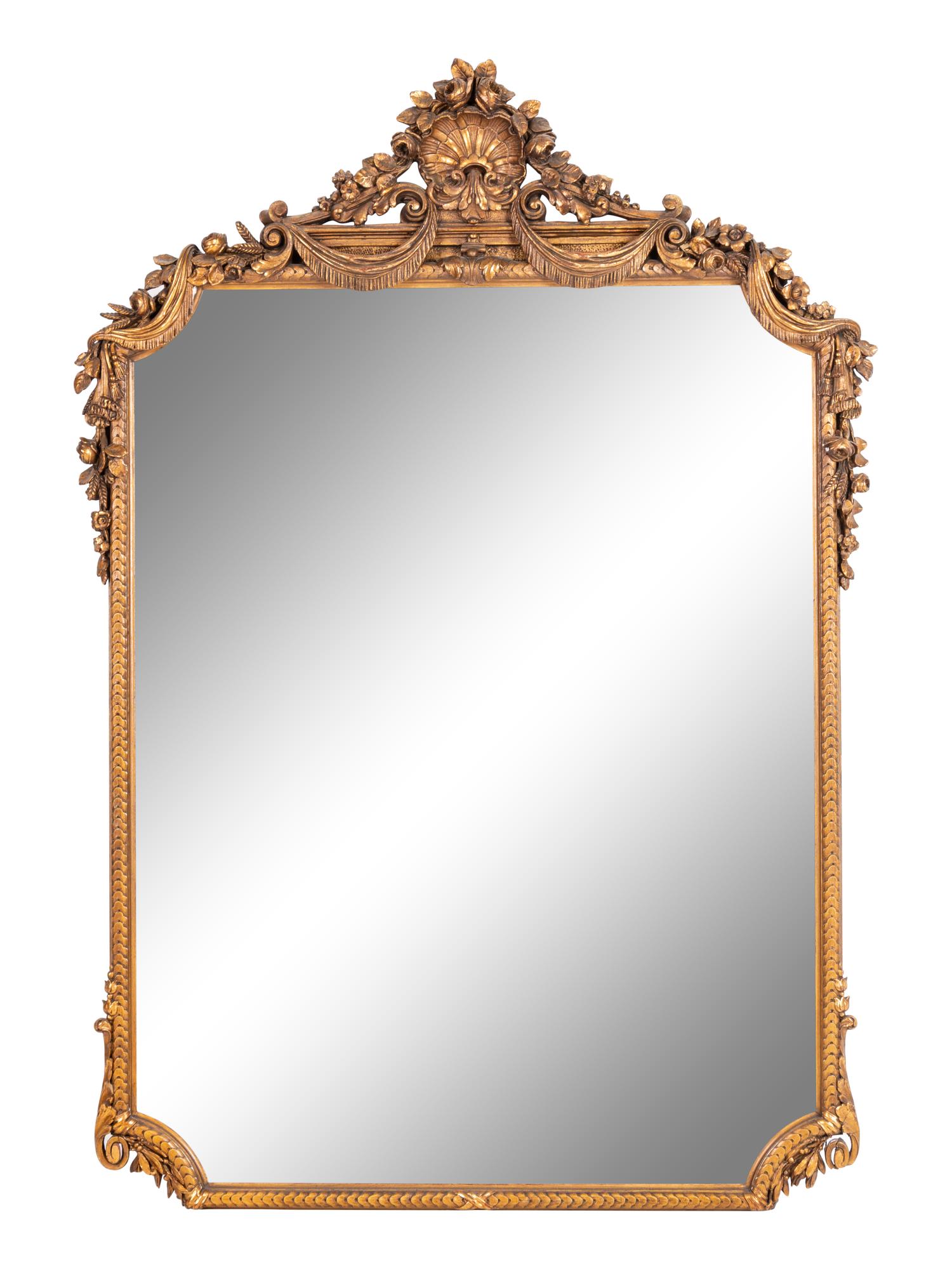 A Neoclassical Carved Giltwood Mirror