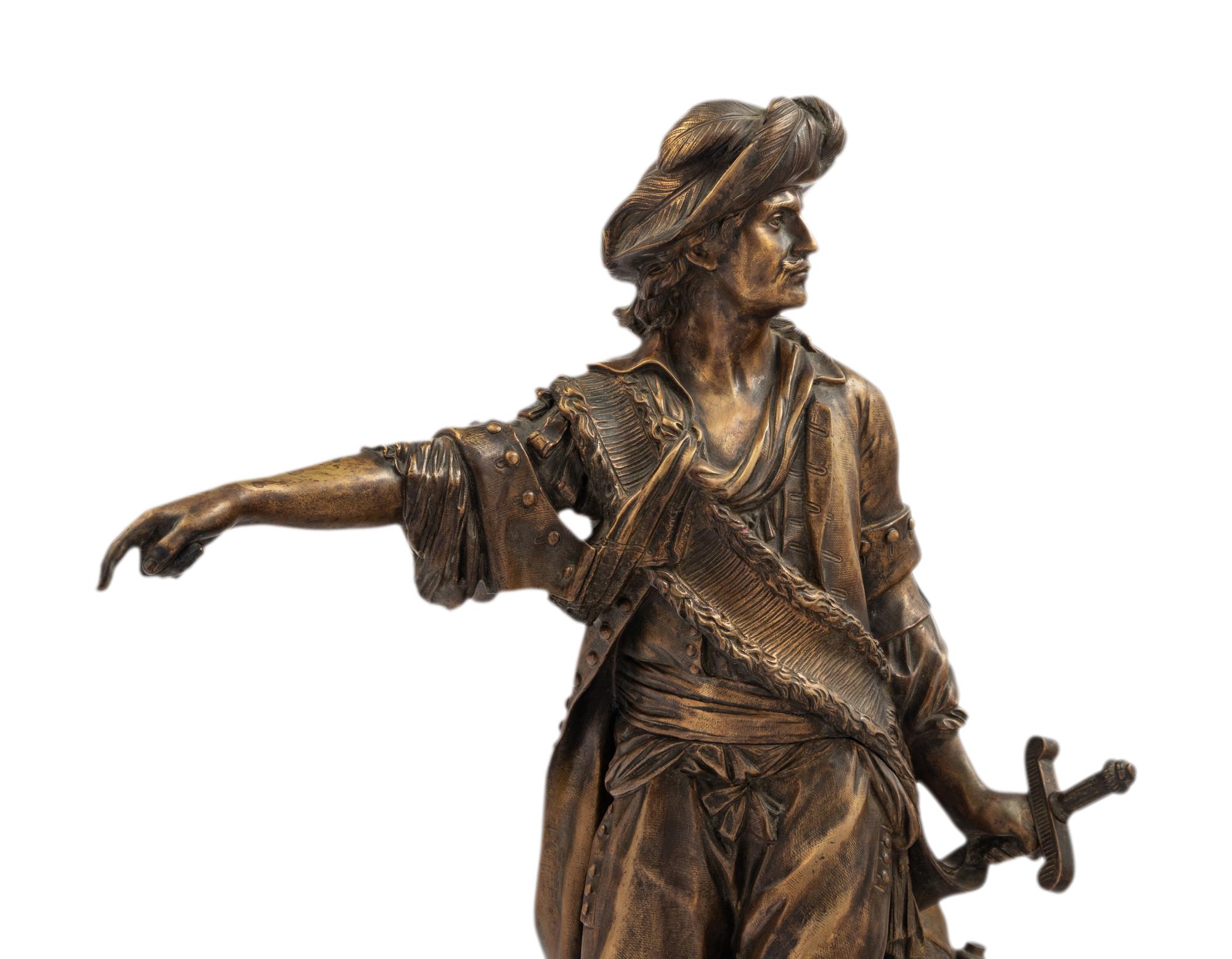 A Gilt Bronze Statue of a Man