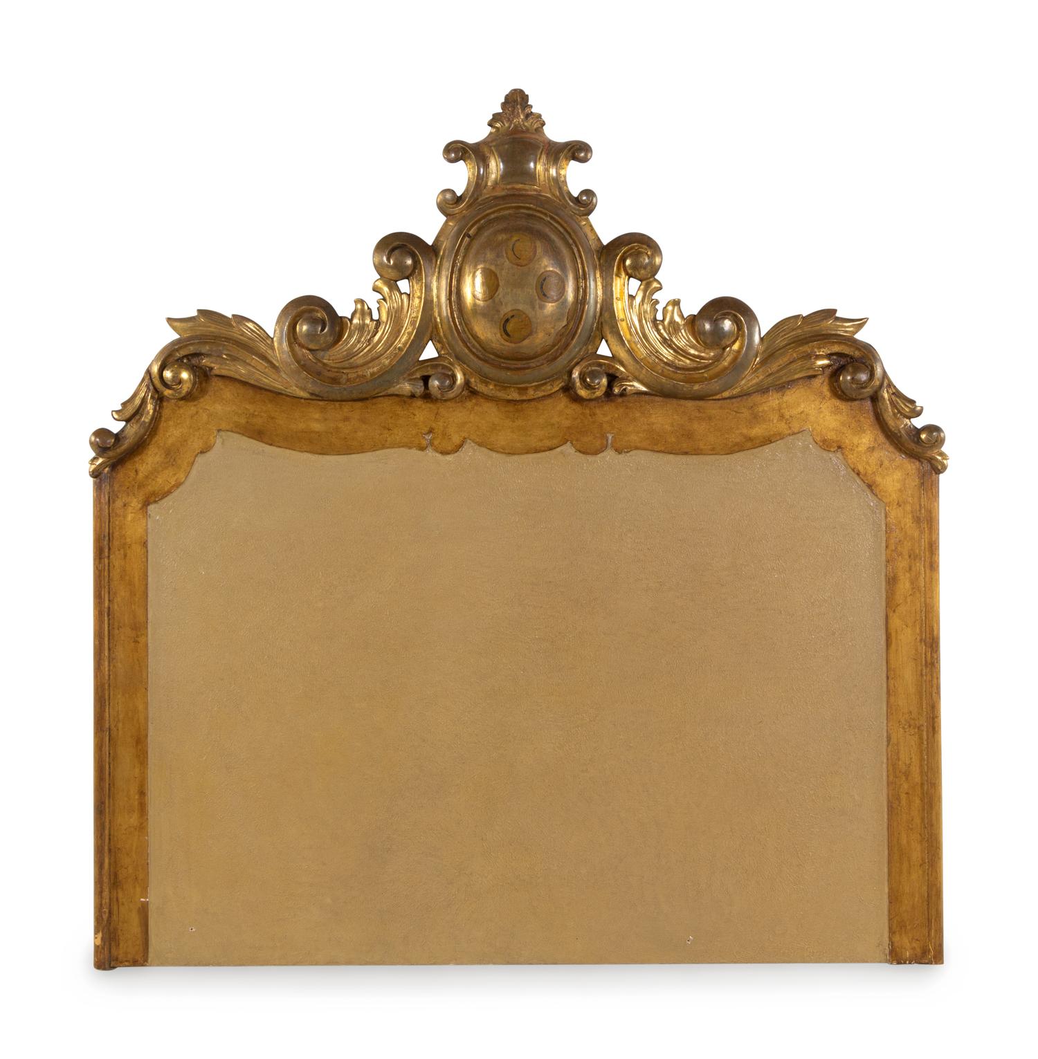A Continental Carved Giltwood Headboard