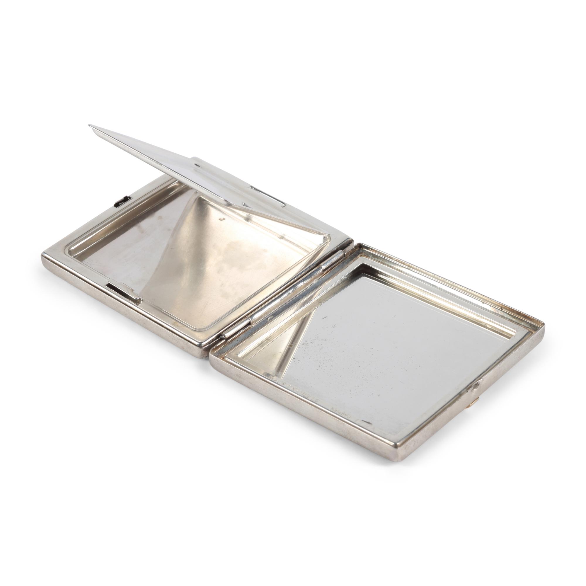 A Cartier-Retailed Silver, 14 Karat Gold and Sapphire Compact