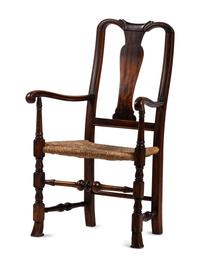 A Queen Anne Transitional Carved Maple Rush-Seat Spanish-Foot Armchair