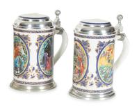 A Collection of German Pewter Mounted Steins