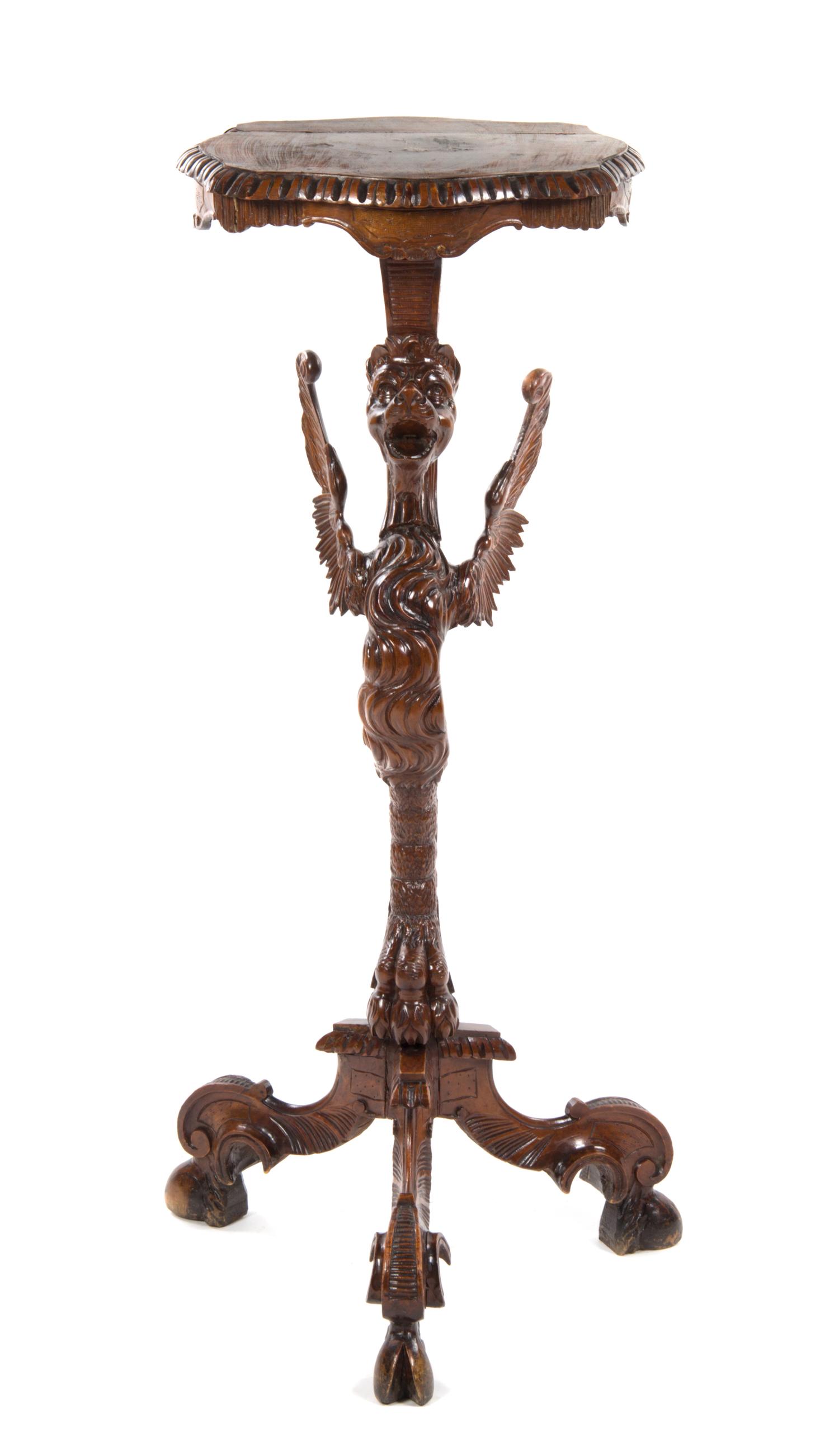 A Renaissance Revival Carved Figural Pedestal, Height 42 inches.