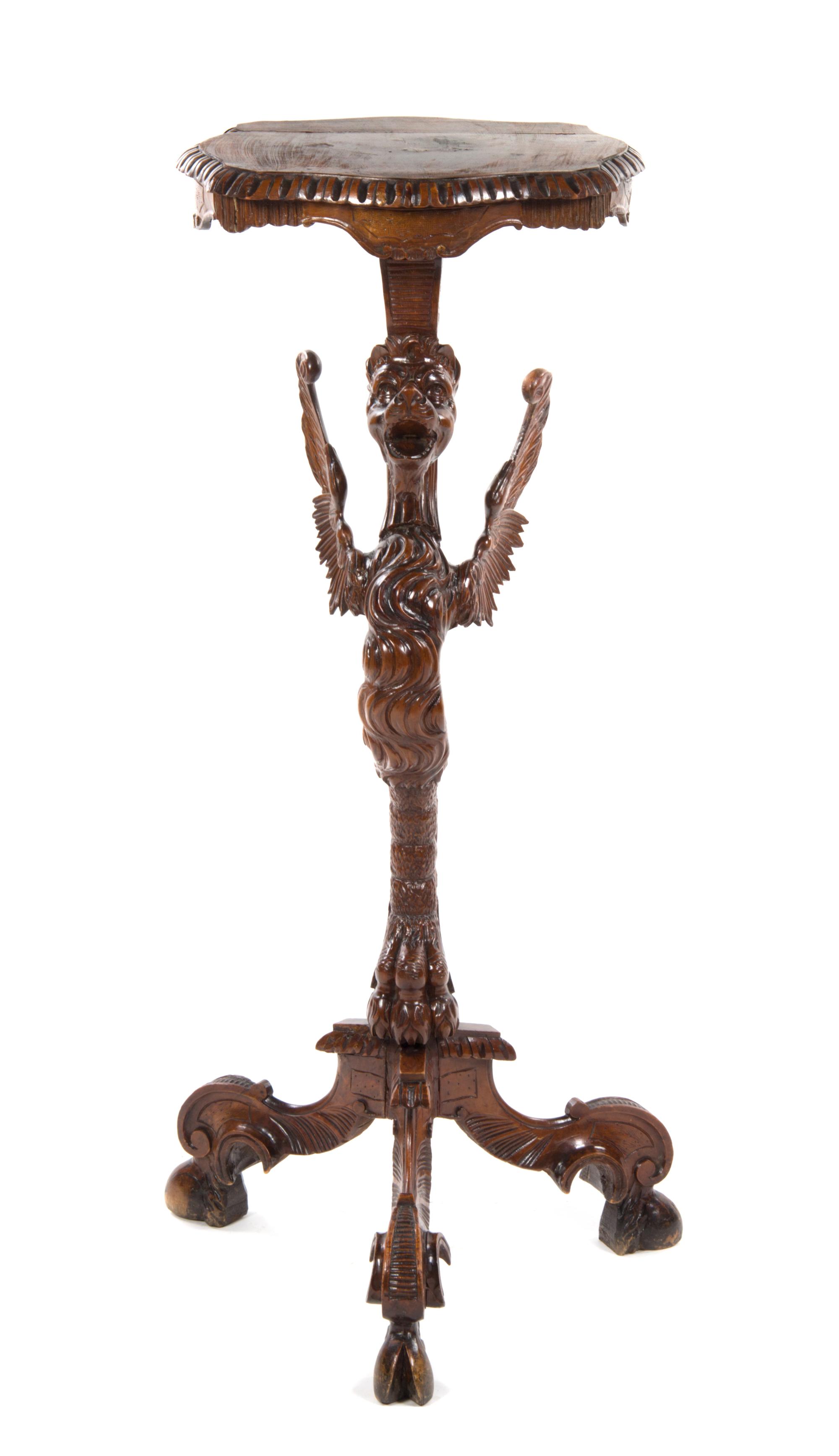 A Renaissance Revival Carved Figural Pedestal, Height 42 inches.