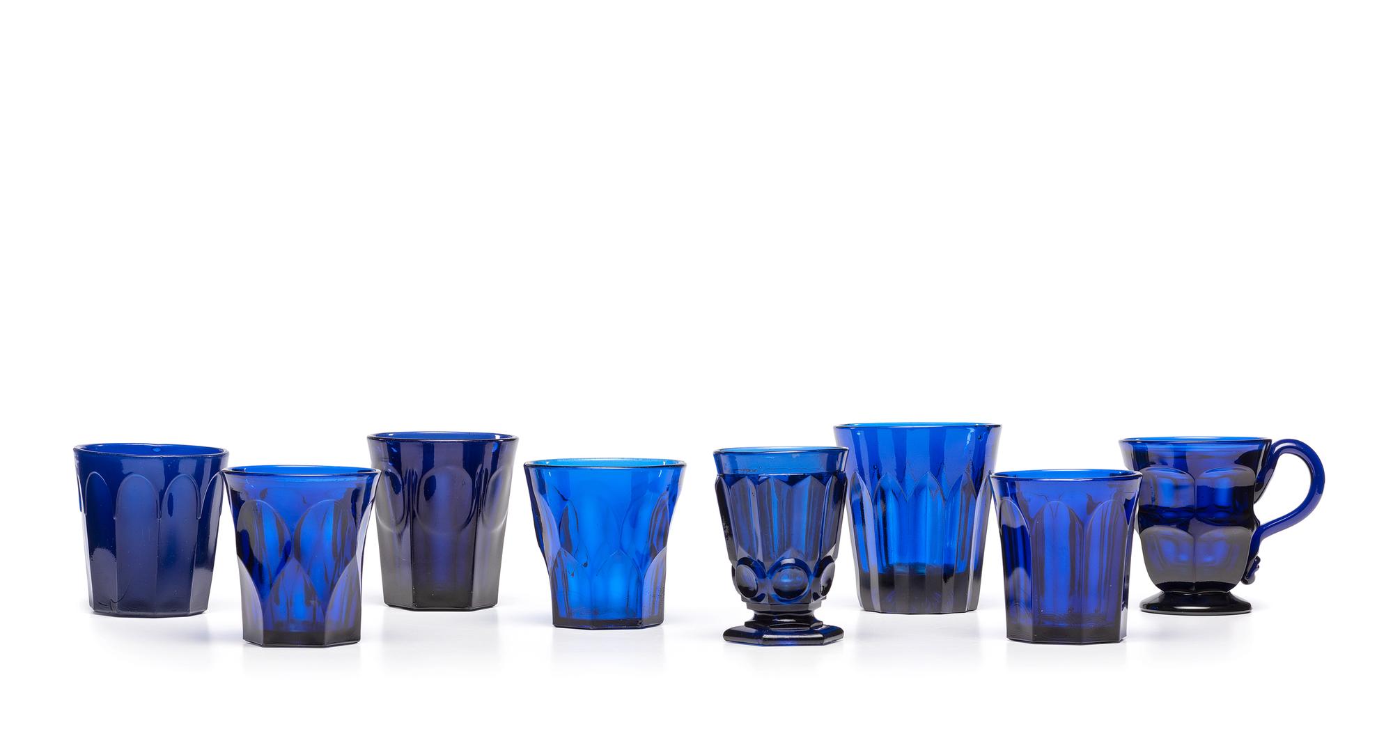 A Group of Early American Pressed Glass Cobalt Tumblers and Mug