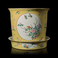 A Chinese Yellow Ground Famille Rose Porcelain Jardiniere and Stand, 20th Century 近代 軋道黃地粉彩花盆
