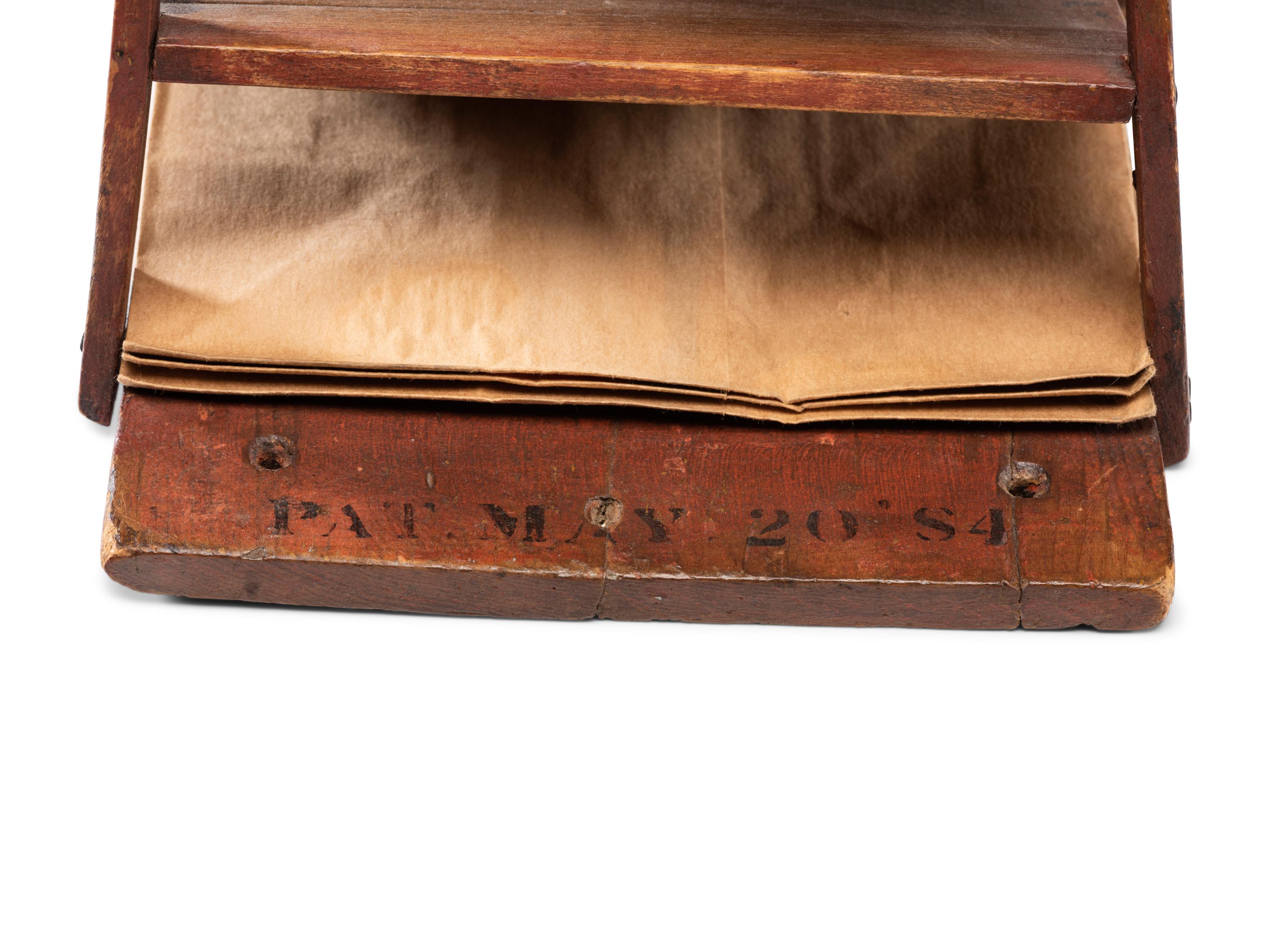 A Stenciled Wood Stratton & Bird Countertop Bag Rack