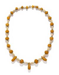 A Near Eastern Carnelian, Quartz, and Faience Bead Necklace
