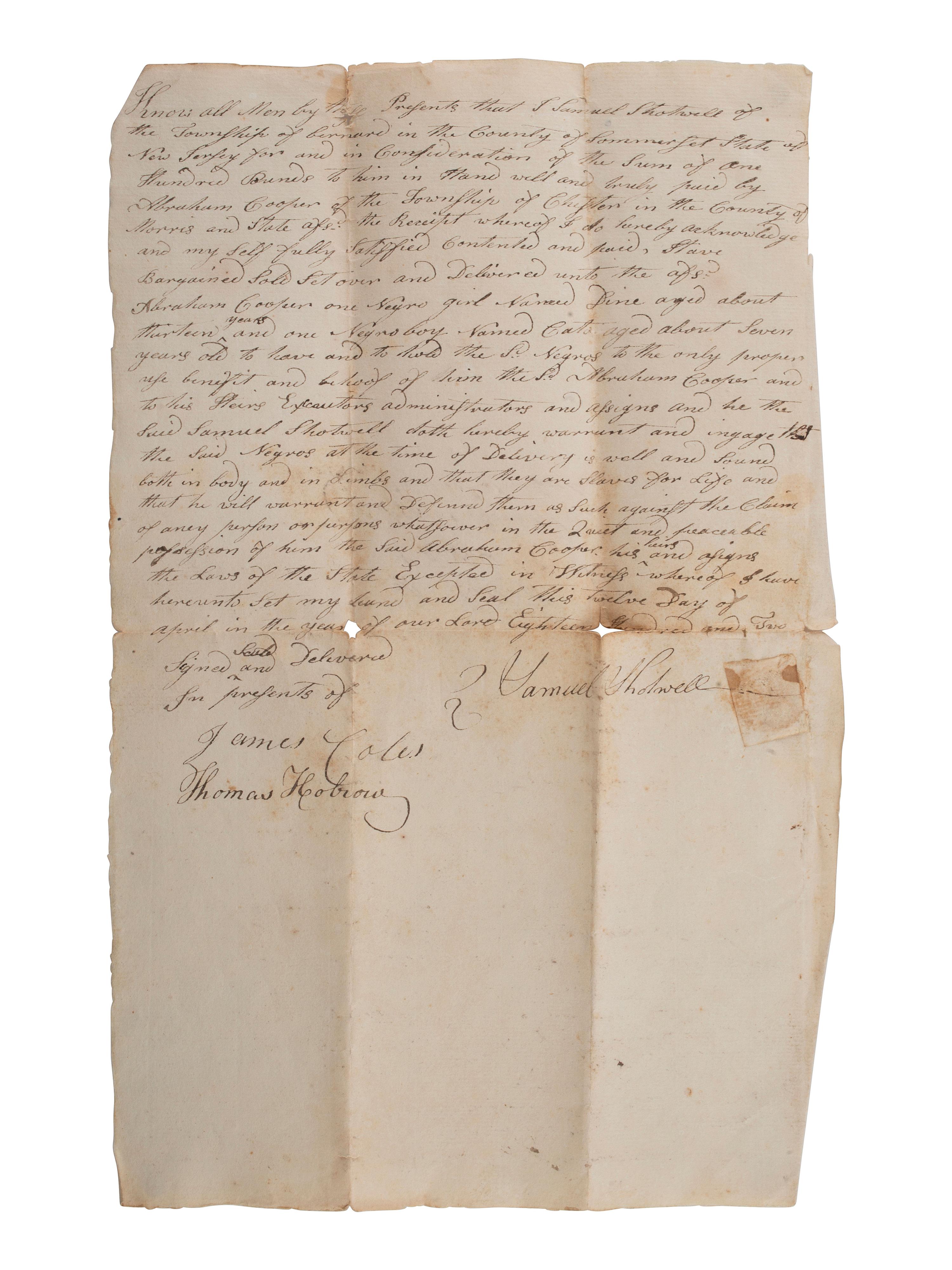 [SLAVERY & ABOLITION]. Manuscript bill of sale for two enslaved individuals, Dine and Cato. New Jersey, 12 April 1802.