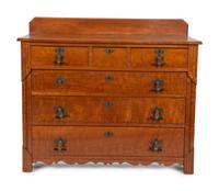 A Victorian Eastlake Aesthetic Flame Cherry Chest of Drawers — EARLY 20TH CENTURY