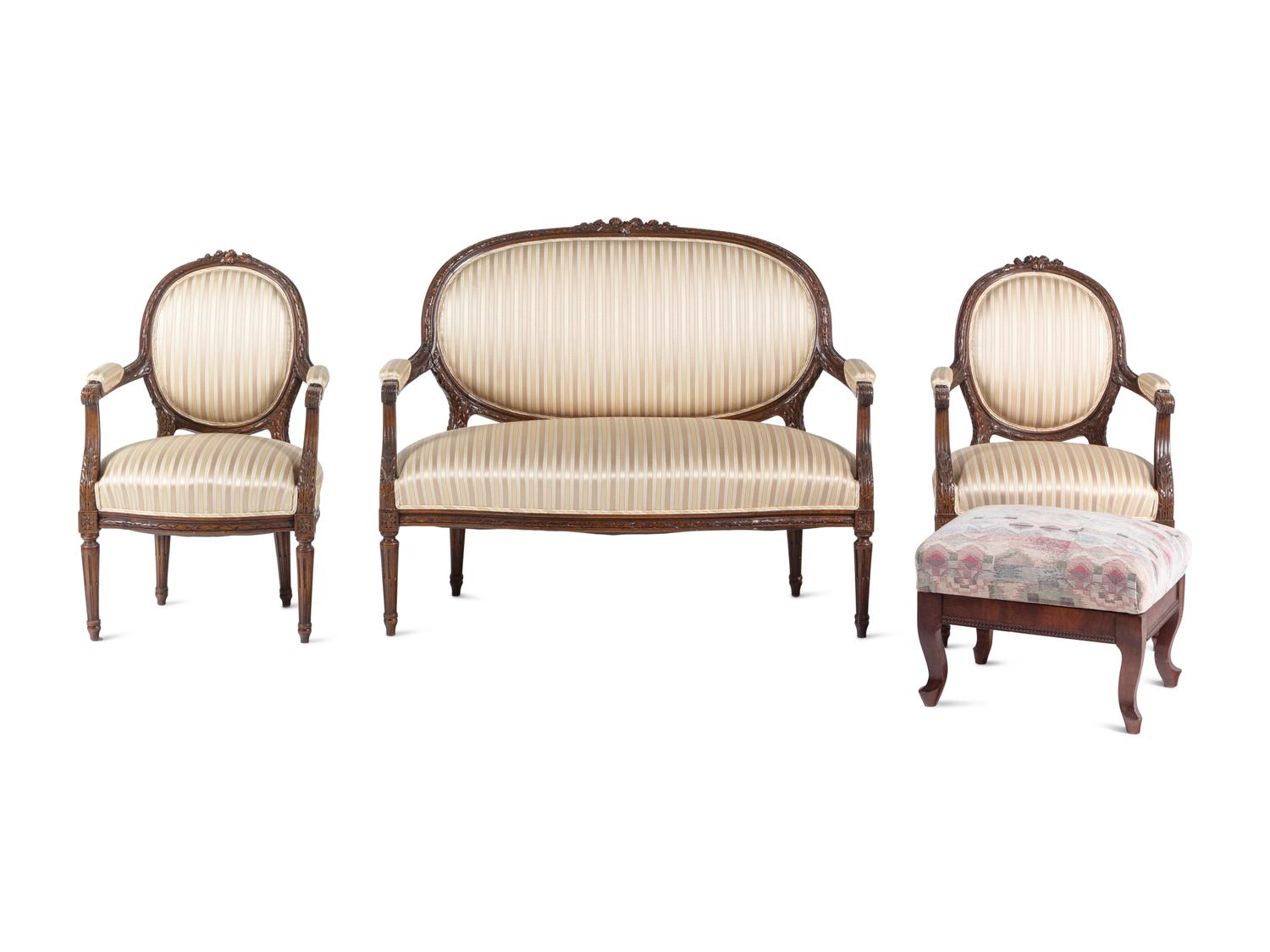 A Louis XVI Style Three-Piece Seating Suite