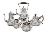 An Edwardian Silver Tea and Coffee Service, Crichton Bros., London, 1901, including a teapot, a coffee pot, a sugar bowl, a creamer and