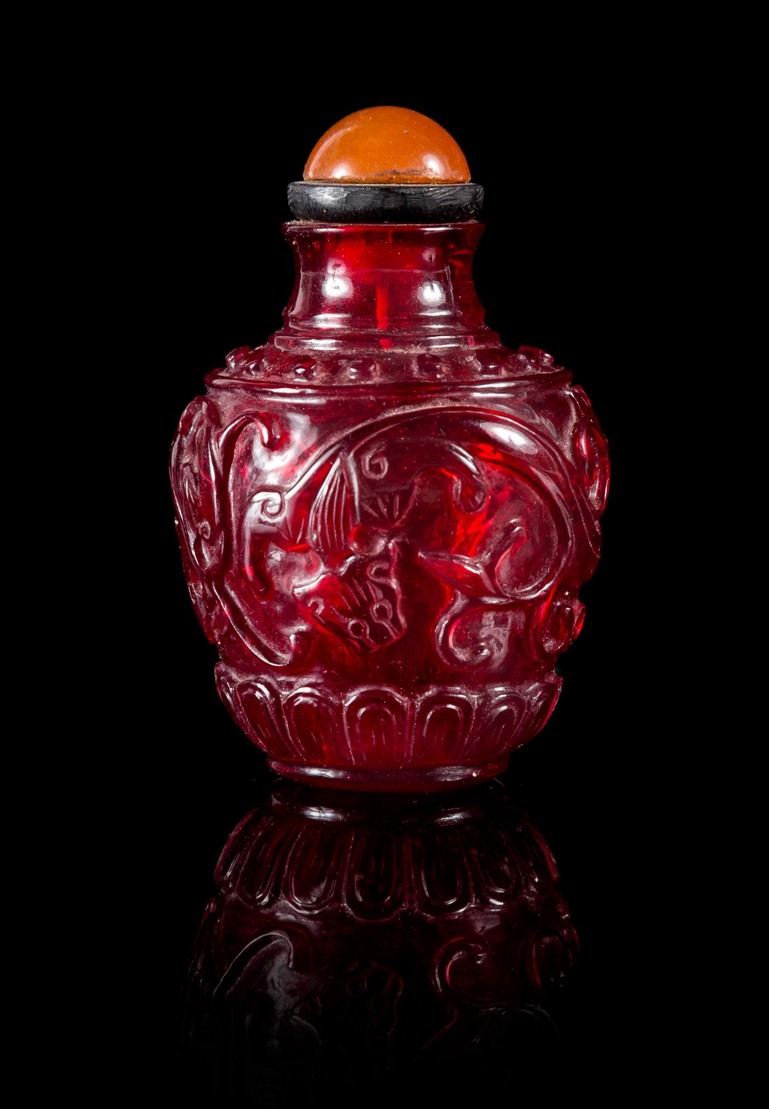 A Ruby Red Peking Glass Snuff Bottle Height 2 3/8 inches.