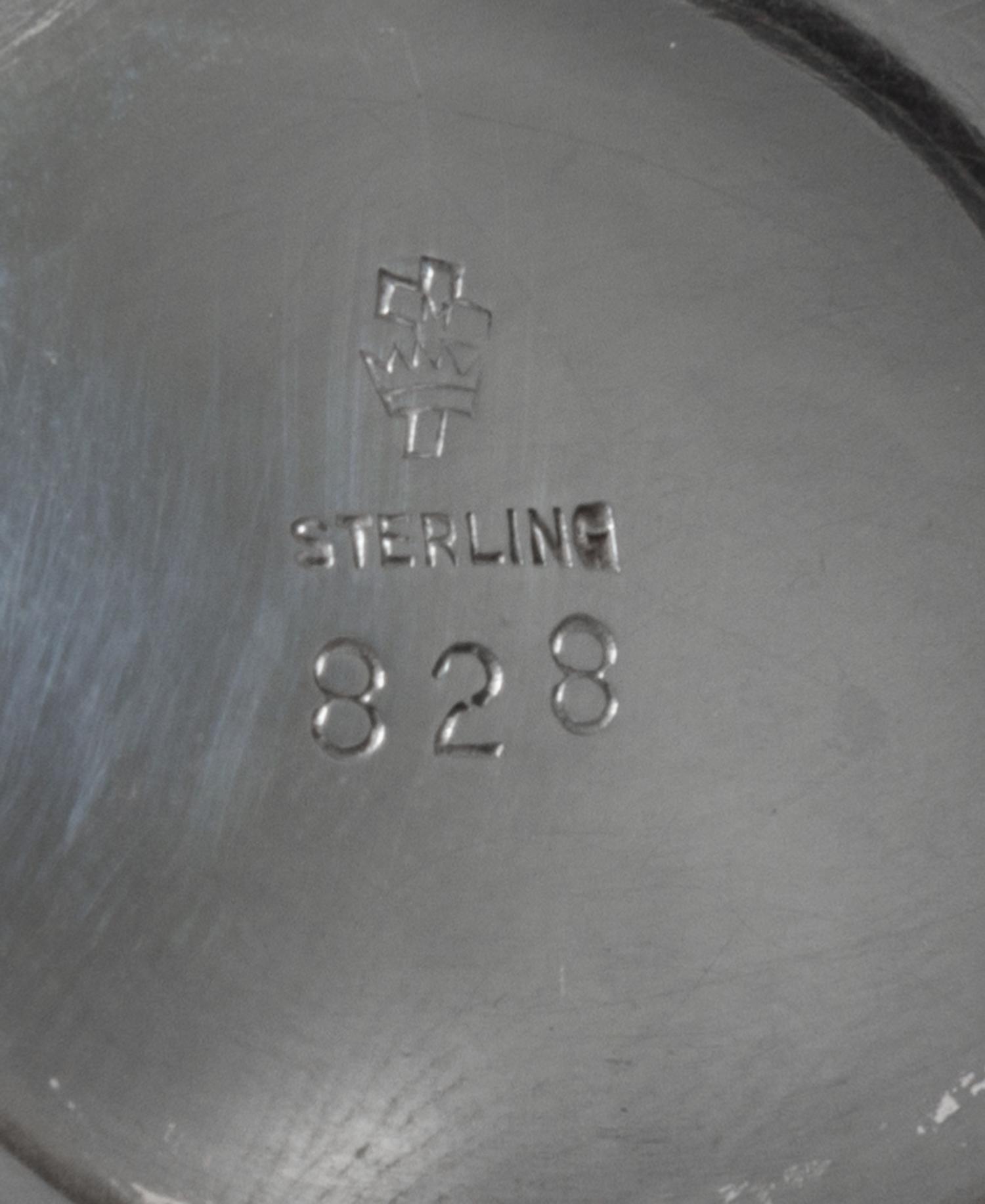 An American Silver Sauce Boat and Underplate, Manchester Silver Co., Providence, RI, 20th Century, of oval form with a banded edge.