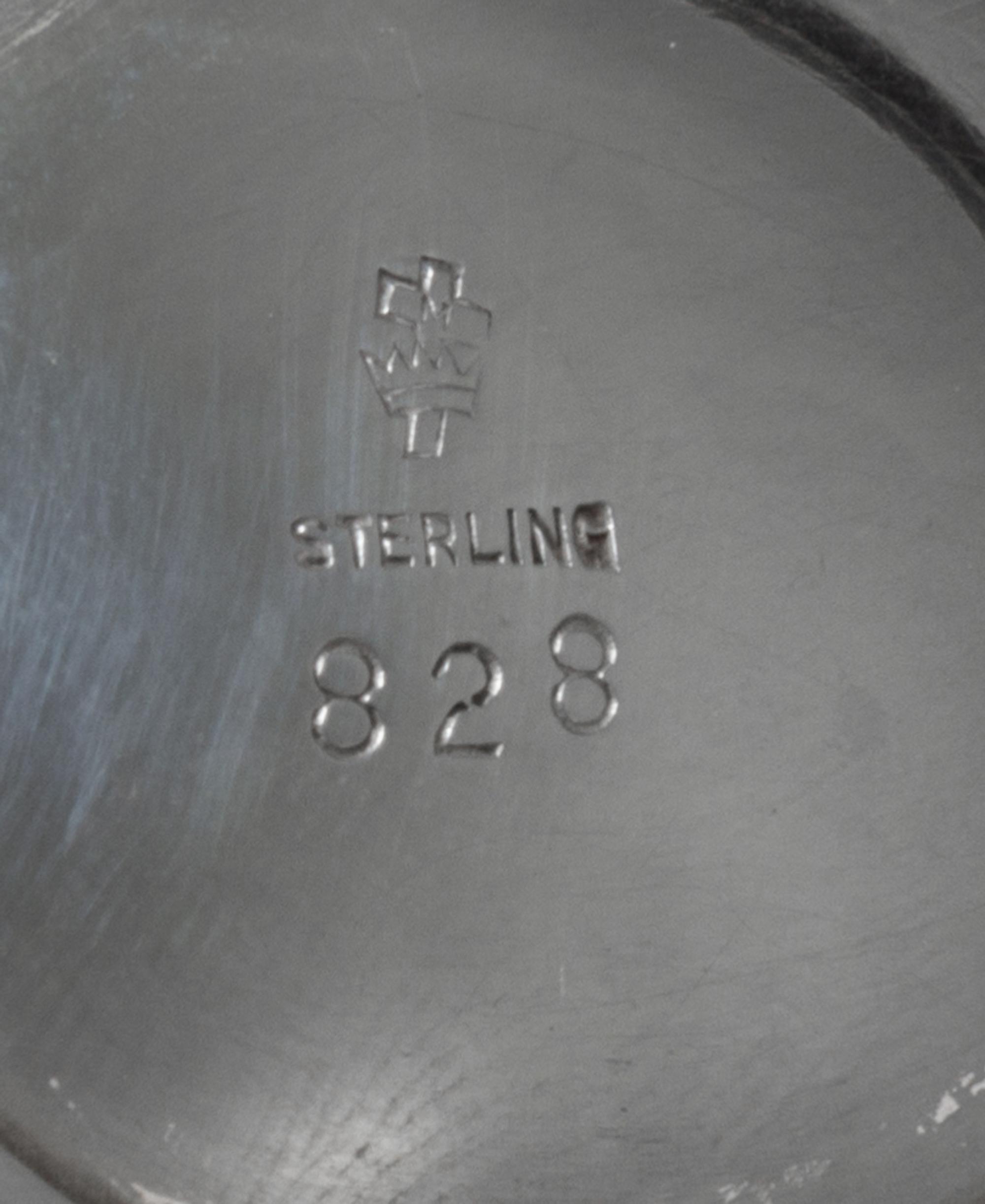 An American Silver Sauce Boat and Underplate, Manchester Silver Co., Providence, RI, 20th Century, of oval form with a banded edge.
