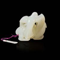 A Chinese carved white jade bird and beast pendant 玉雕一件 Qing dynasty ?