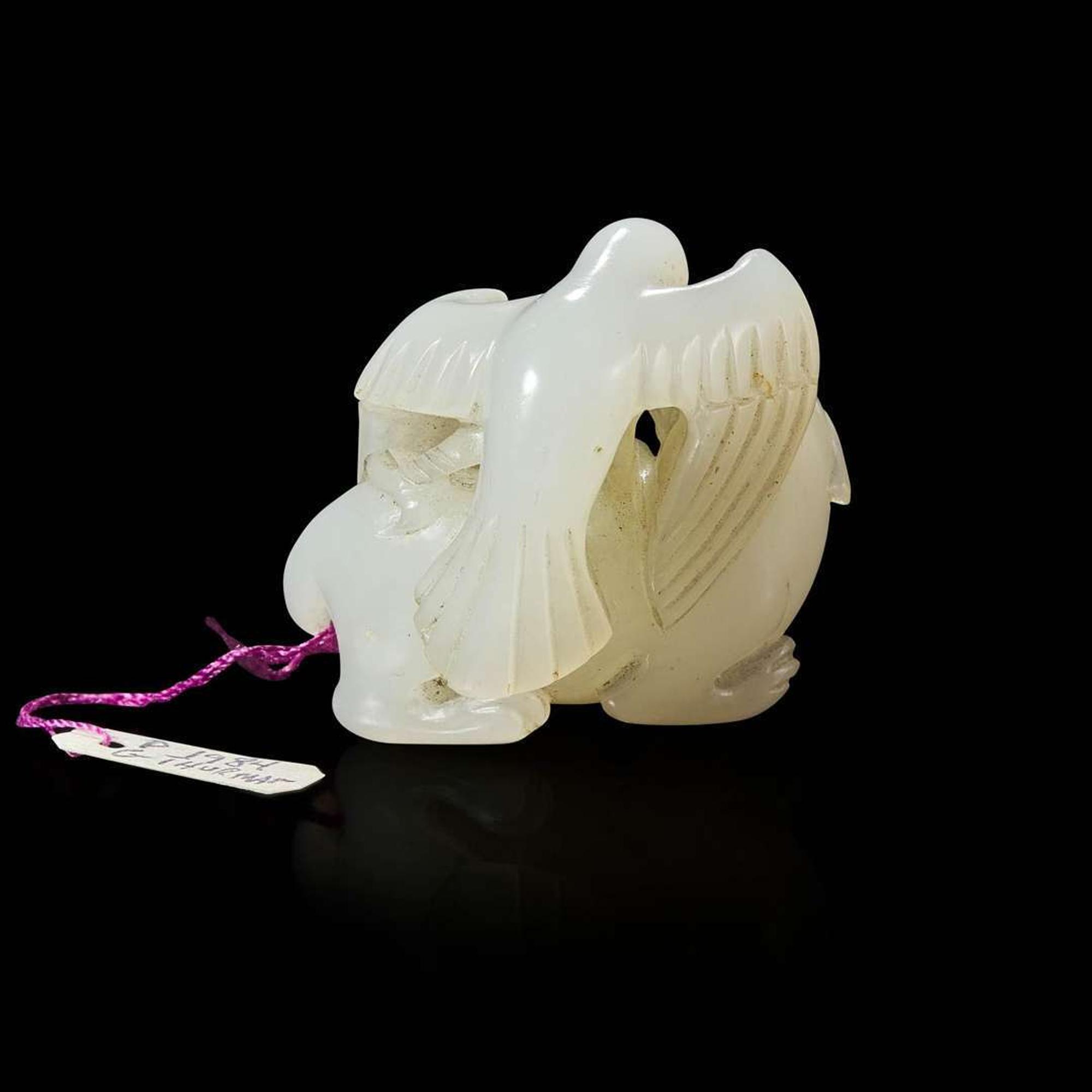 A Chinese carved white jade bird and beast pendant 玉雕一件 Qing dynasty ?