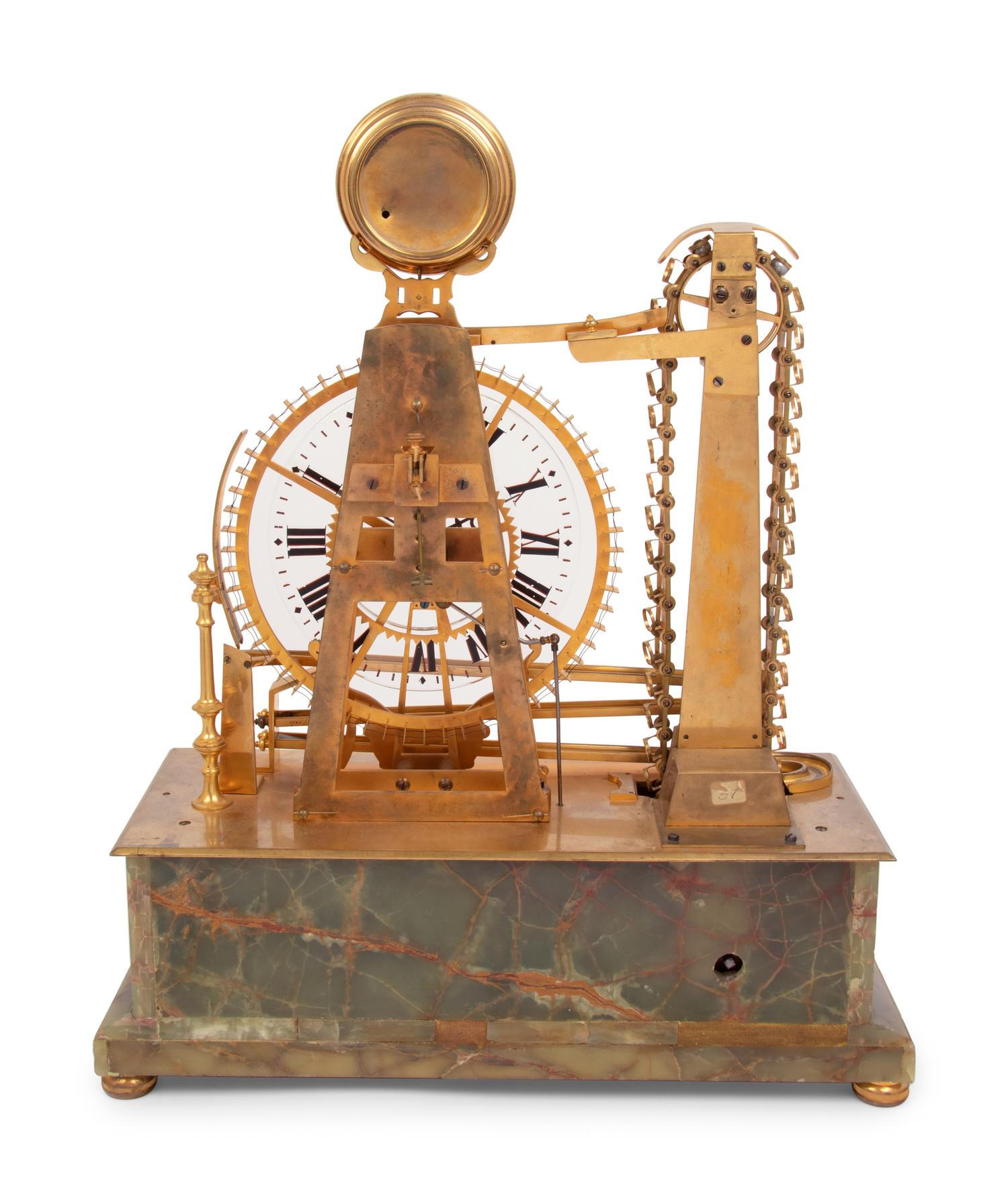 A French Gilt Metal and Onyx Mounted Compound Congreve Waterwheel Clock, Thermometer and Barometer