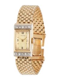 BULOVA, 14K YELLOW GOLD AND DIAMOND WRISTWATCH