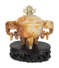 A Chinese Carved Hardstone Tripod Censer