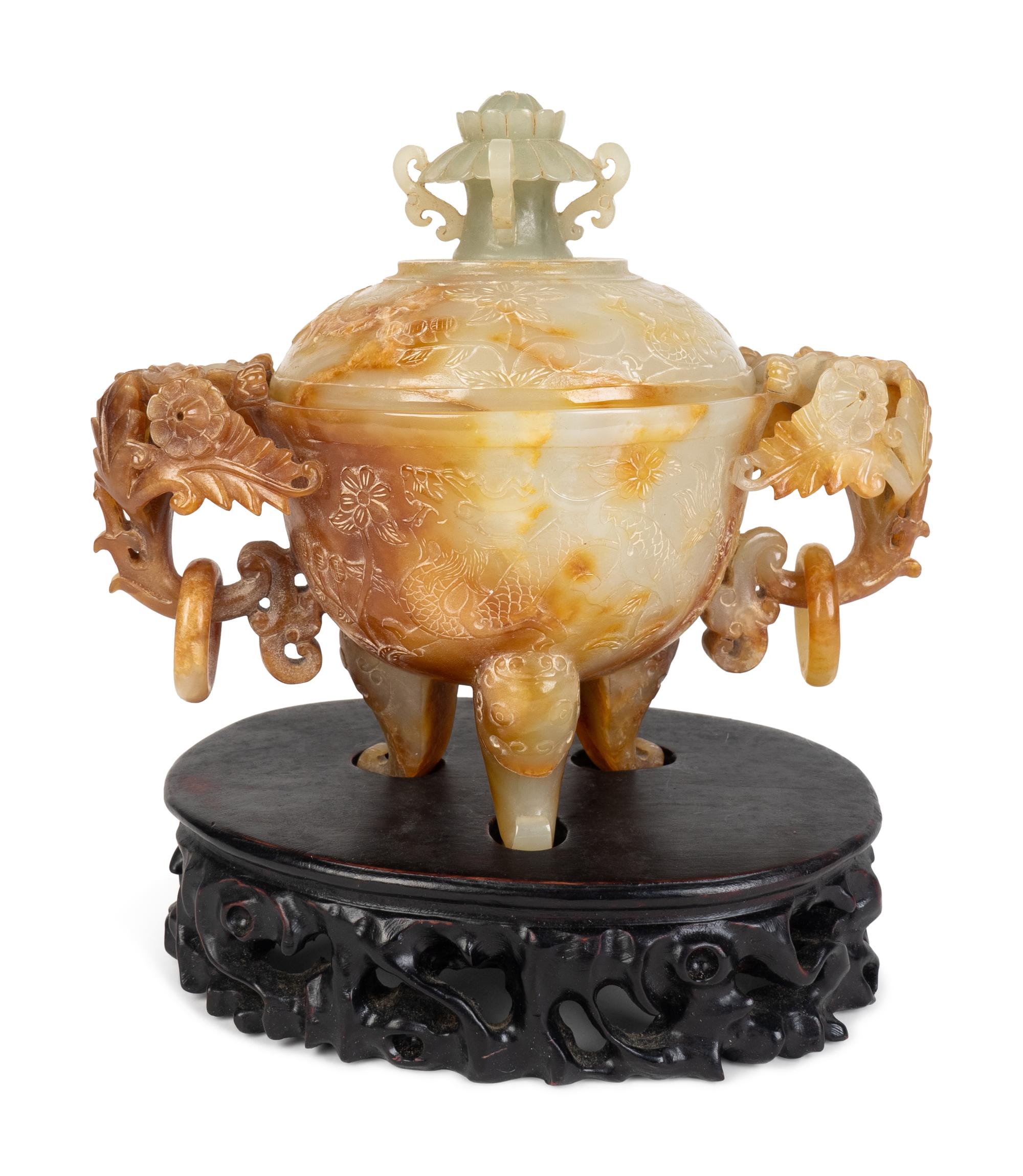 A Chinese Carved Hardstone Tripod Censer