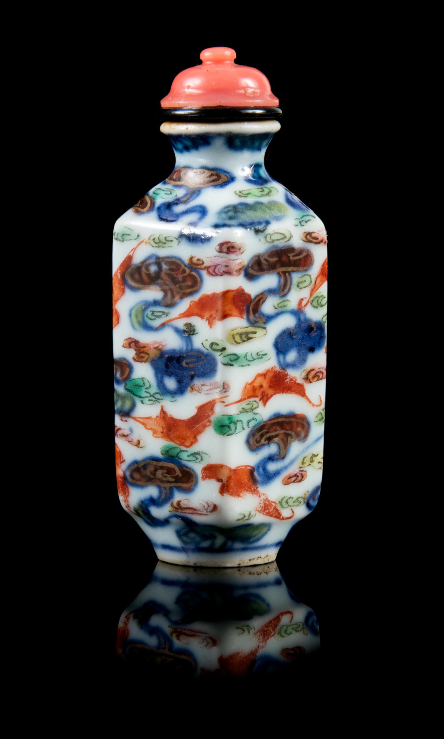 An Underglaze Blue and Enamelled Porcelain Snuff Bottle Height 2 7/8 inches. — JIAQING PERIOD (1796-1820)