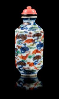 An Underglaze Blue and Enamelled Porcelain Snuff Bottle Height 2 7/8 inches. — JIAQING PERIOD (1796-1820)