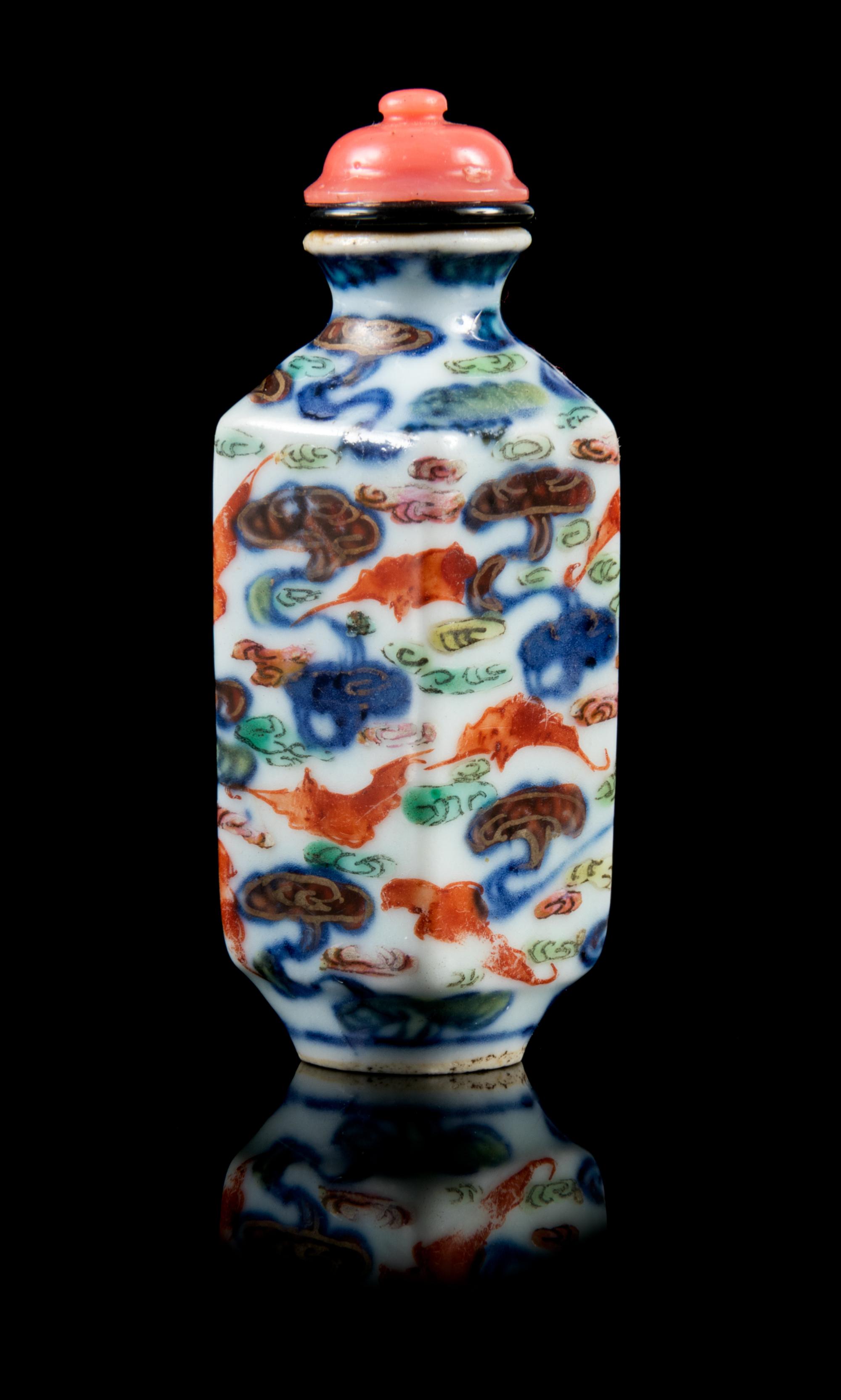 An Underglaze Blue and Enamelled Porcelain Snuff Bottle Height 2 7/8 inches. — JIAQING PERIOD (1796-1820)