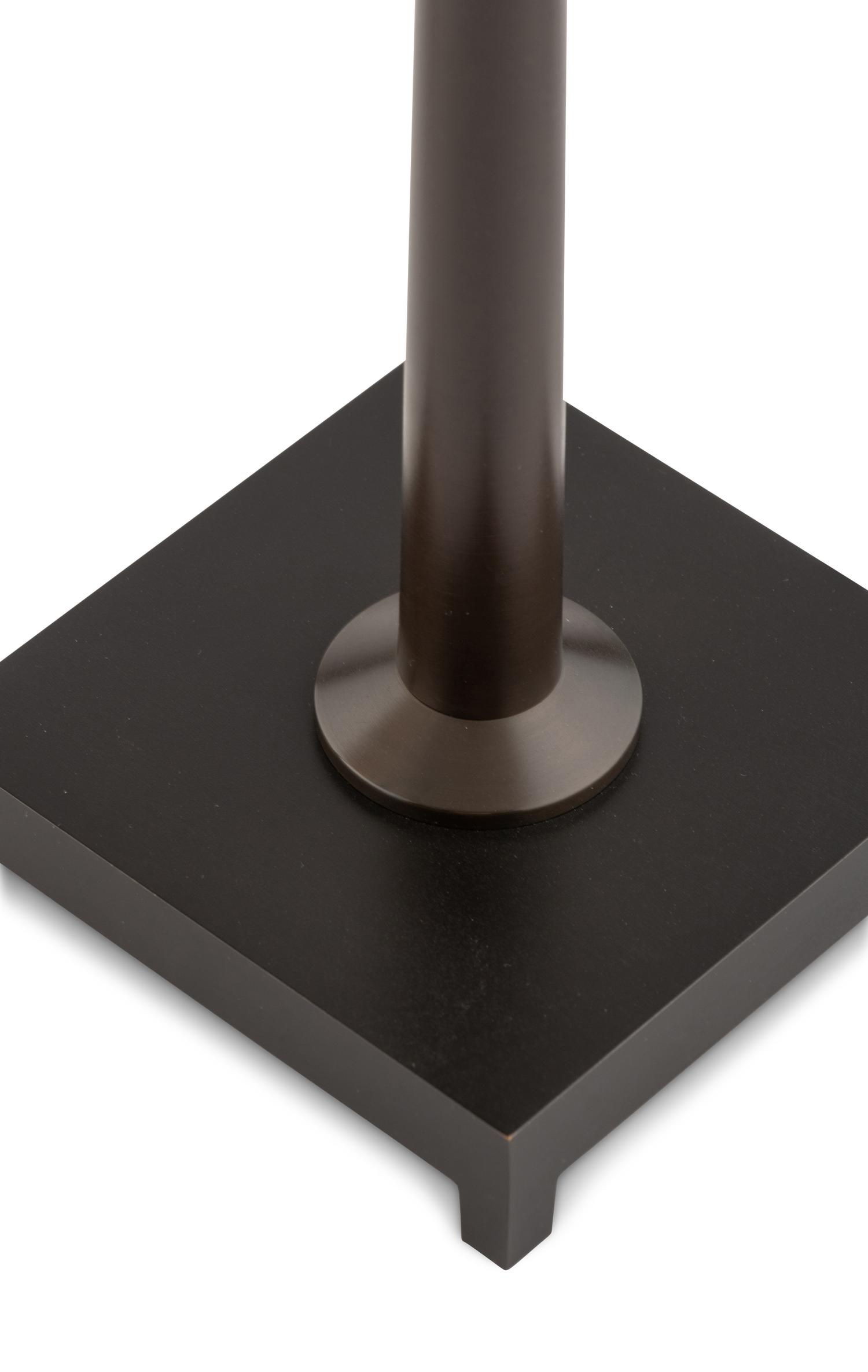 A Pair of Patinated Metal Lamps