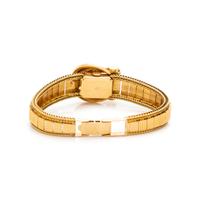 MOVADO, 18K YELLOW GOLD SURPRISE WATCH