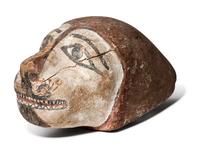 An Egyptian Polychrome Wood Head of a Lion