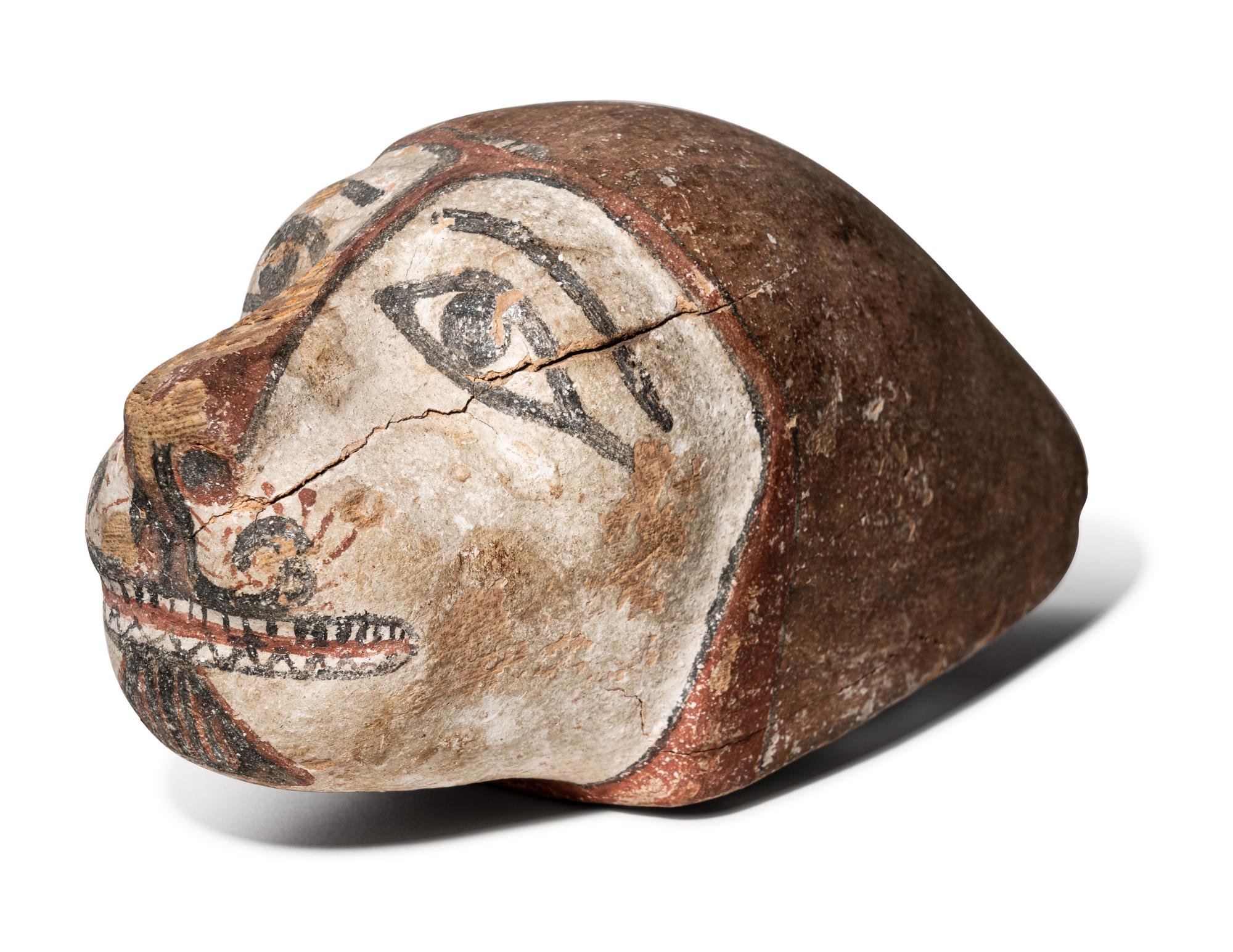 An Egyptian Polychrome Wood Head of a Lion
