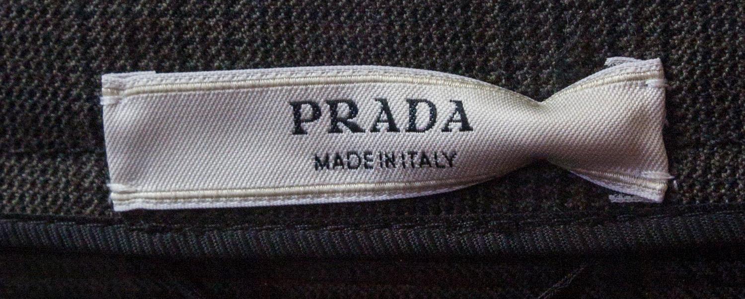 A Prada Olive Wool Plaid Skirt Suit, Jacket size 44, skirt size 42.