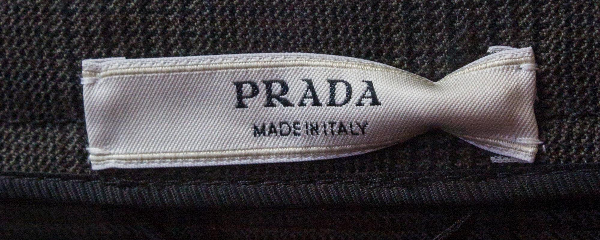 A Prada Olive Wool Plaid Skirt Suit, Jacket size 44, skirt size 42.