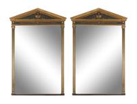 A Pair of Neoclassical Style Parcel Gilt and Ebonized Mirrors