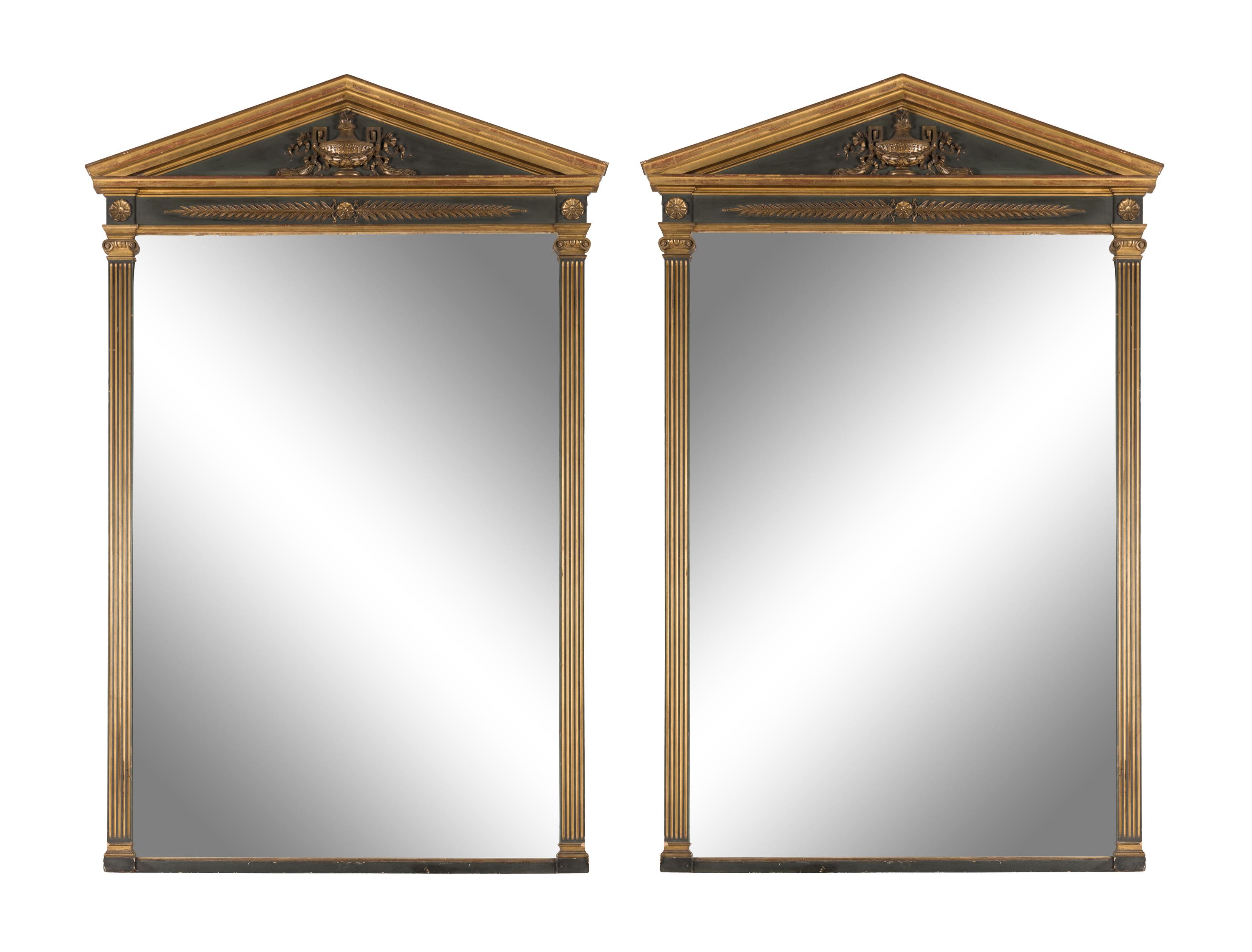 A Pair of Neoclassical Style Parcel Gilt and Ebonized Mirrors