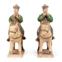 A Pair of Terracotta Equestrian Musician Figures