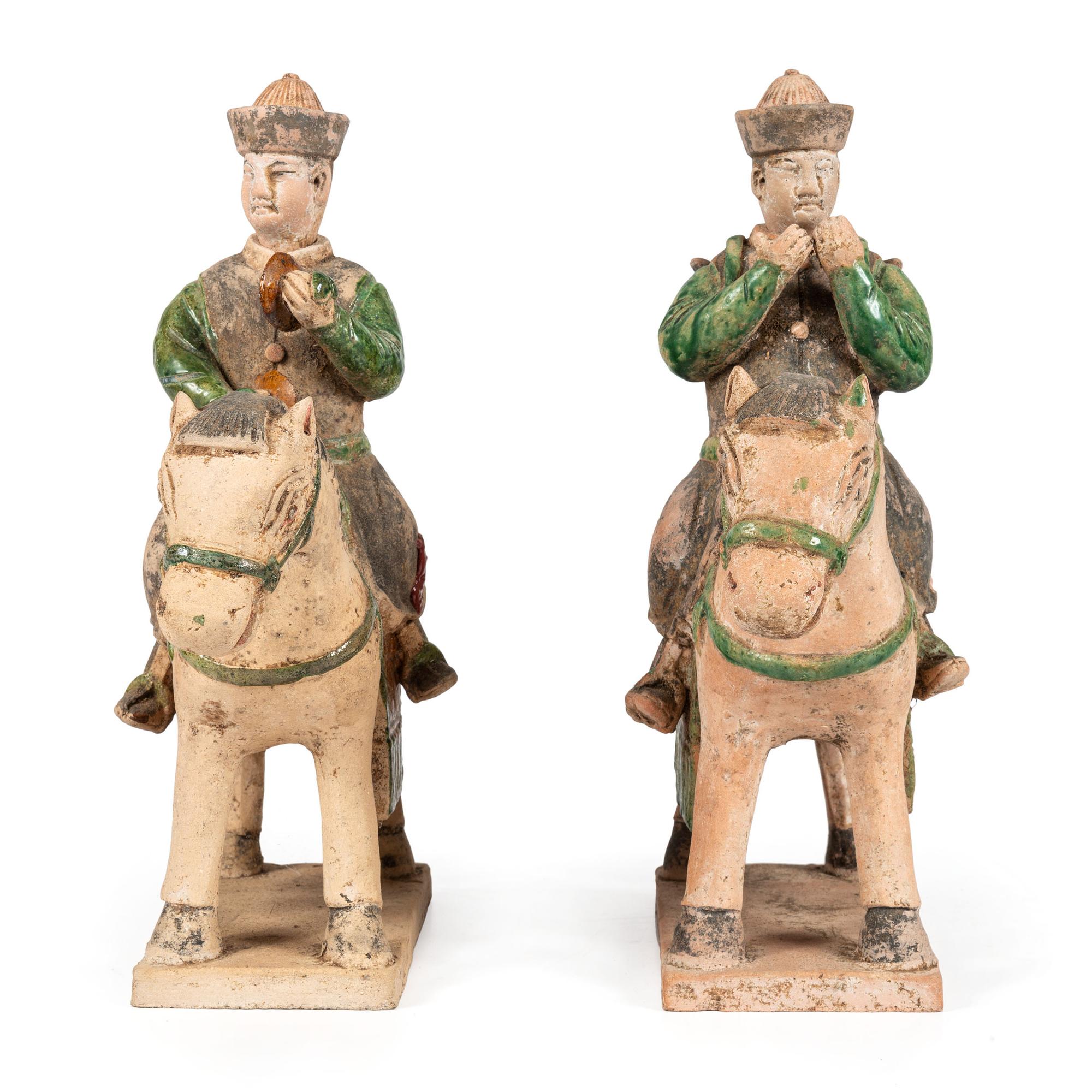 A Pair of Terracotta Equestrian Musician Figures