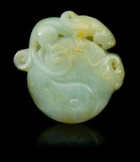 A Carved Jade Toggle Length 1 7/8 inches.