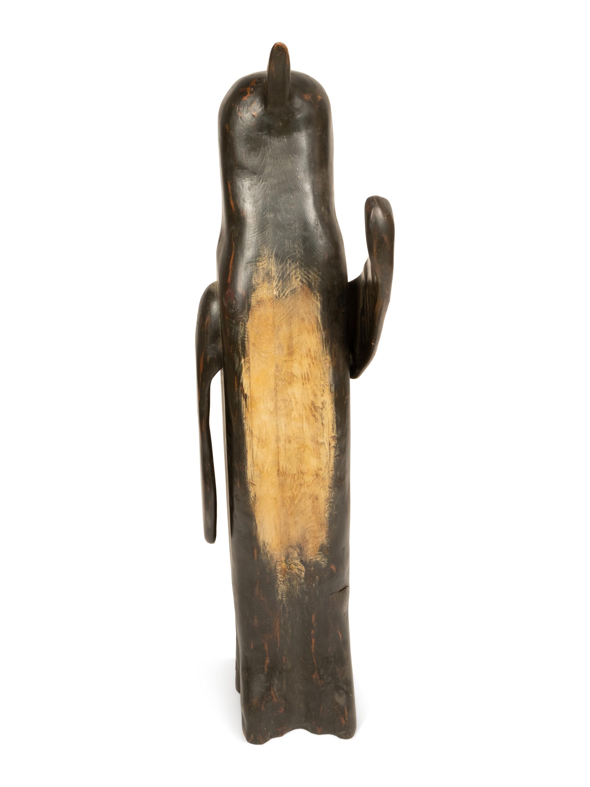 A Folk Art Carved Penguin
