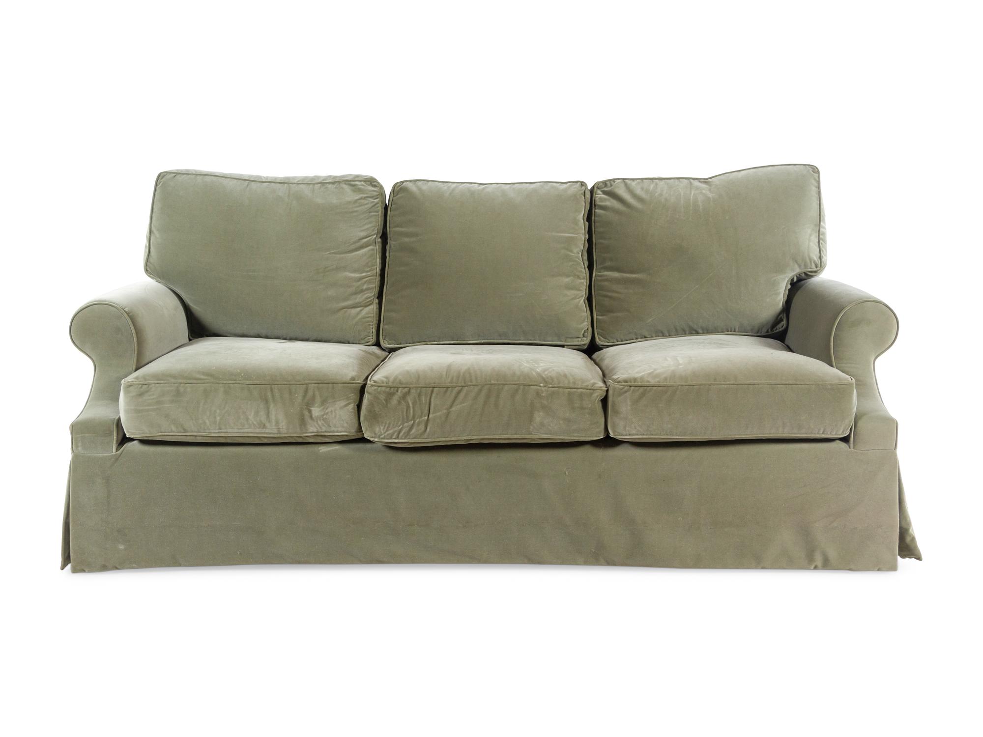 A Green Velvet Upholstered Three-Seat Sofa