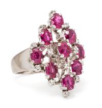 An 18 Karat White Gold, Ruby and Diamond Ring, 5.20 dwts.