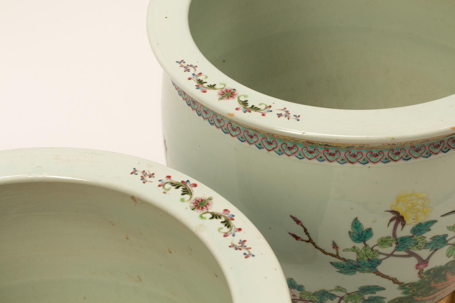 A Pair of Chinese Porcelain Jardinieres with Gilt Bronze Bases