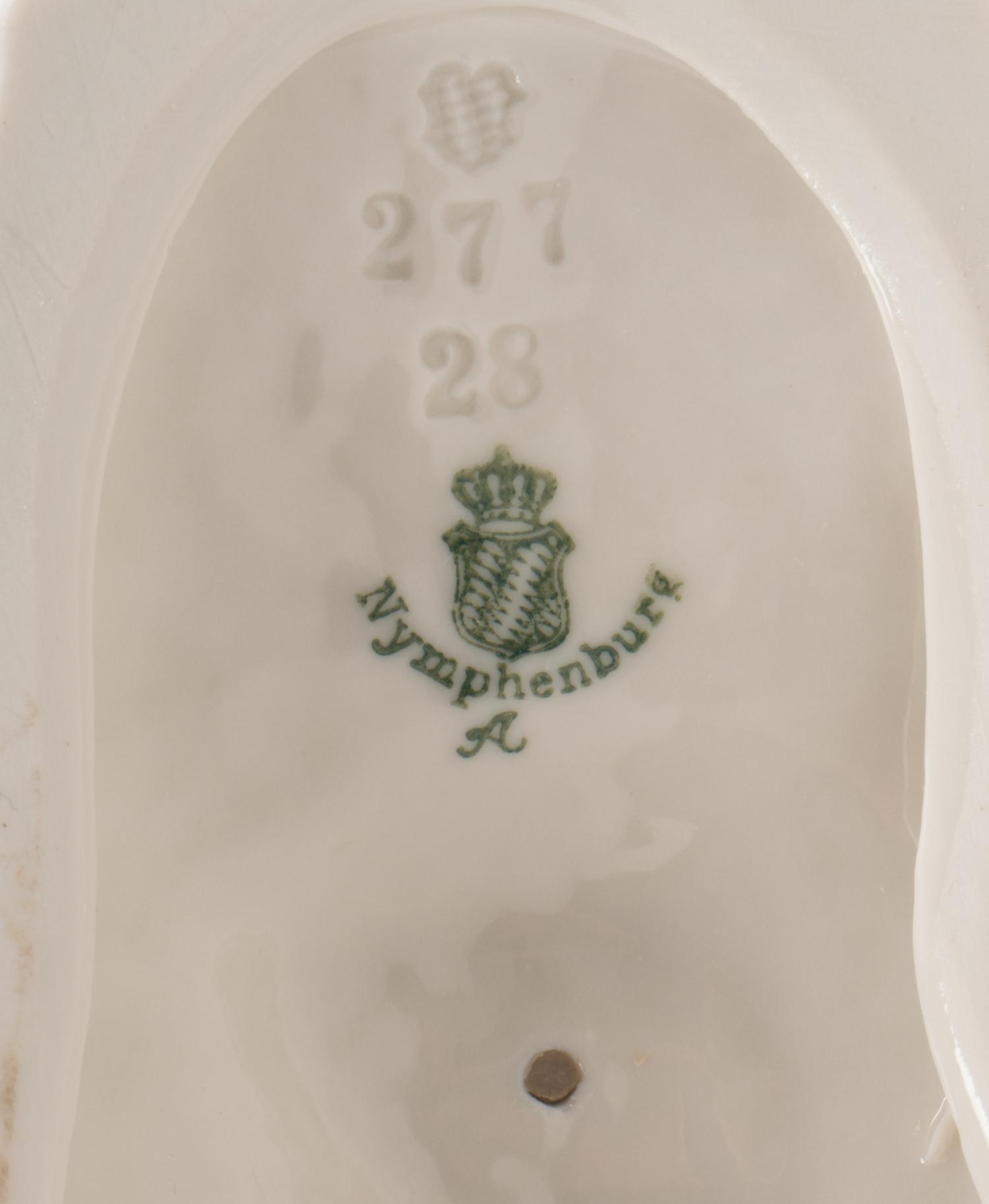 A Group of Twelve Nymphenburg Porcelain Equestrian Groups